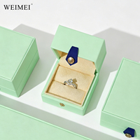 WEIMEI Vente en gros Élégante Boîte à bijoux carrée en cuir PU vert menthe avec anneau de tirage en cuir noir pour collier