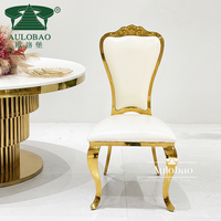 Chaises de salle à manger d'extérieur de luxe italiennes pour événements, en cuir PU blanc et acier inoxydable plaqué or, style baroque