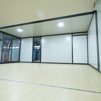Maison conteneur en acier à toit plat, fabriquée sur mesure en usine, pliable, mobile, à double aile extensible, moderne, pour hôtel, maison ou bureau