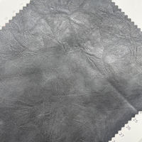 Tissu en cuir PU gaufré avec support en rayonne de 0.7MM personnalisé le dernier cuir synthétique à motifs