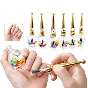 Aceite nutritivo para el cuidado <span class=keywords><strong>de</strong></span> las cutículas <span class=keywords><strong>de</strong></span> las uñas con logotipo personalizado 15ml aceite nutritivo para uñas con flores secas <span class=keywords><strong>de</strong></span> <span class=keywords><strong>plantas</strong></span> - Product Image 1