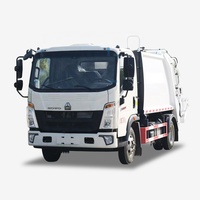Nouveau camion compacteur de déchets léger Howo 6 m³ à chargement arrière