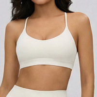 Soutien-gorge de sport respirant à bretelles croisées au dos, séchage rapide, en Spandex/Nylon, col en V profond, rembourrage amovible, maintien moyen, idéal pour le yoga et la gym