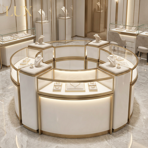 Ensemble de comptoirs de présentation de bijoux LUX incurvés blancs et dorés avec tiroirs pour les boutiques de luxe modernes - Product Image 1