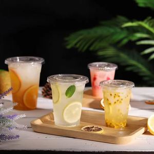 Vasos Desechables Transparentes de Plástico PET de 20 Onzas con Tapas para Té de Burbujas y Café - Product Image 1