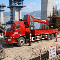 Le fabricant fournit une grue montée sur camion de 12 tonnes avec télécommande sans fil pour levage et transport intégrés