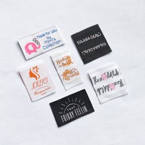 Étiquettes tissées personnalisées haute densité avec logo de marque pour vêtements et textiles - Product Image 1