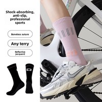 Chaussettes de cyclisme professionnelles épaisses personnalisées pour femmes, en coton, absorbantes, respirantes, antibactériennes, anti-odeurs, anti-boulochage, à motif géométrique