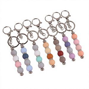 Meilleures ventes en stock : Coque de téléphone légère DIY avec perles et dessins animés, pendentif support pour écouteurs, porte-clés en alliage métallique dégradé coloré - Product Image 3