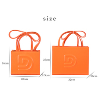 Sacs à main en cuir PU orange avec logo personnalisé en relief, sacs fourre-tout de luxe pour femmes, sacs à main de marque pour femmes fabriqués en usine