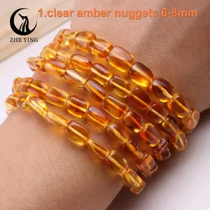 Zhe Ying braccialetti di ambra naturale all'ingrosso perline di ambra rotonde commercio di braccialetti di pietra di ambra piebald dorati insanguinati