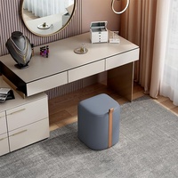 Tabouret de maquillage en tissu moderne et simple pour chambre à coucher, pouf bas minimaliste de luxe léger pour petit appartement