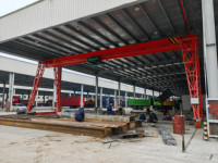 Portail de levage de construction grue à portique montée sur rail vente chaude nouvelle conception pour le transport de matériaux 20t