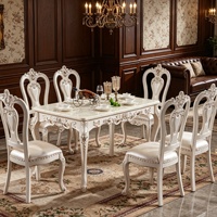 Ensemble de table à manger moderne en marbre français, chaises en bois massif sculptées à la main, meubles de salle à manger de luxe pour la maison, vente en gros