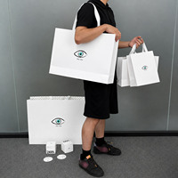 Custom Eye Graphic Printed Paper Bag White Satin Ribbon Handle for Jewelry Perfume Packaging