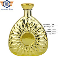 Bouteille de luxe de 700 ml en verre décoratif vide, plaquée or, à facettes, pour brandy, tequila et spiritueux haut de gamme, personnalisable
