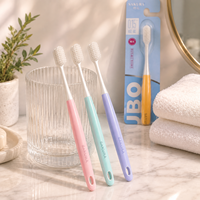 Brosse à dents ergonomique en PP sans BPA avec poils PBT doux de qualité supérieure pour l'hygiène bucco-dentaire à usage quotidien à la maison