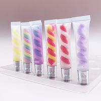Tube en spirale multicolore en gros d'usine clair liquide hydratant imperméable à l'eau longue durée brillant à lèvres chatoyant parfumé aux fruits