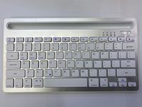 Keyboard nirkabel, papan ketik Mini dengan bantalan portabel Slot tempat ponsel untuk ponsel pintar Tablet