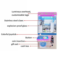 En gros, mini machine de jeu d'arcade à monnayeur pour bonbons et grue à peluches, économique, avec lecteur de billets, pour enfants