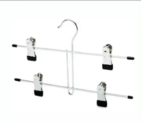 Cintre fonctionnel durable en métal chromé à 2 niveaux avec pinces à pantalons enduites de PVC