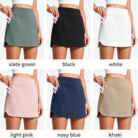 Jupe-short OEM personnalisée pour femme, taille froncée sur le côté, séchage rapide, ourlet fendu avec poches, doublure anti-frottement pour le golf, le tennis et l'entraînement