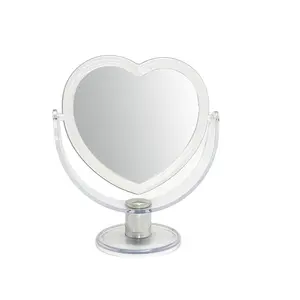工場カスタマイズプラスチックカットラブハート型化粧鏡女性用寝室の両面デスクトップ化粧鏡