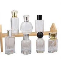 Flacon de parfum en verre de 100 ml en gros avec 15 vaporisateurs à baïonnette, fond épais, cylindre en résine pour bouchon à bille, logo personnalisé, sérigraphie