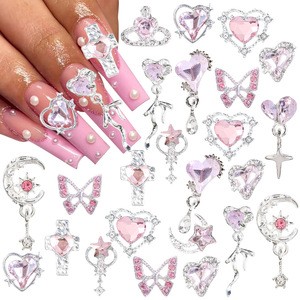 Vente en gros de plusieurs styles de breloques de décoration d'<span class=keywords><strong>ongles</strong></span> en strass <span class=keywords><strong>pour</strong></span> les décorations de <span class=keywords><strong>faux</strong></span> <span class=keywords><strong>ongles</strong></span> en cristal avec nœud papillon 3d et cœur - Product Image 1