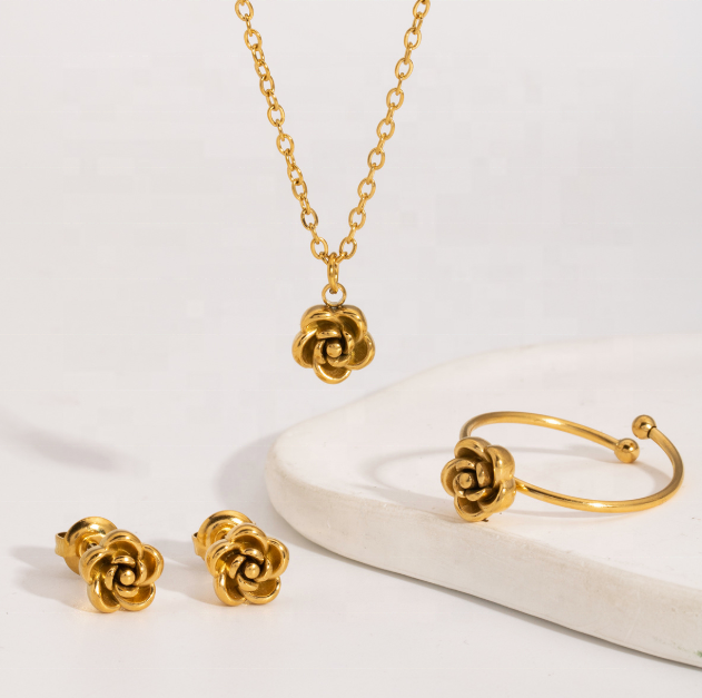 European and American Hot-Selling Stainless Steel PVD 18K Gold Plated Cast Rose Pendant Necklace Earrings Ring Fashion Set