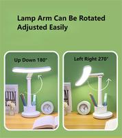 Lampe de bureau LED moderne et élégante porte-stylo Arc Eye Care Conception en nid d'abeille Tête réglable Corps en ABS Alimentation CC pour salle de lecture