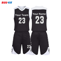 Buker personnalisé de haute qualité colorant sublimé jeunes hommes blanc et noir couleur basket-ball porter maillot uniforme