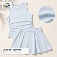 Ensemble de tennis décontracté pour femmes, débardeur sans manches et jupe plissée en nylon et élasthanne, vêtements de sport pour la vente en gros