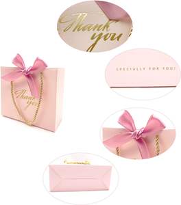 <span class=keywords><strong>Sac</strong></span> en papier <span class=keywords><strong>de</strong></span> <span class=keywords><strong>luxe</strong></span> personnalisé et recyclable avec poignée longue et nœud pour Noël et le <span class=keywords><strong>Black</strong></span> <span class=keywords><strong>Friday</strong></span> – Vente en gros - Product Image 6