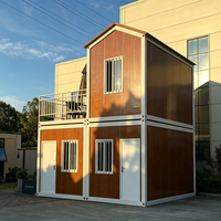 Maison modulaire préfabriquée à deux étages en conteneurs d'acier, murs respirants en panneaux sandwich, design contemporain, assemblage rapide pour usage résidentiel