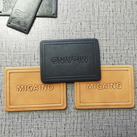 Usine personnalisé en gros en relief en cuir Pu Logo fer sur patchs étiquettes pour vêtements chapeaux Jeans