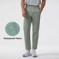 Pantalons d'extérieur Pantalons de jogging coupe-vent avec logo personnalisé pour hommes Tissu imperméable pour le sport Décontracté d'extérieur pour adultes Cordon de serrage plat