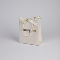 Sacs cadeaux luxueux en papier épais mat rose clair personnalisables SUNNY PACK avec poignée pour boutique de bijoux