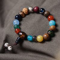 Bracelet en perles émaillées à dix-huit graines