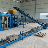 Nouvelle machine automatique hydraulique de fabrication de blocs de pavé autobloquants QT4-15 avec pompe, moteur et PLC Dongyue, longue durée de vie, pour ligne de ciment