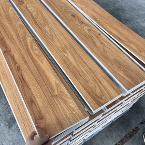 Vente en gros de planches de vinyle rigides Unilin Click de 5 mm, 100% imperméables, revêtement de sol SPC pour projets commerciaux - Product Image 3