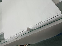 Perforatrice automatique industrielle pour calendriers, carnets et feuilles mobiles