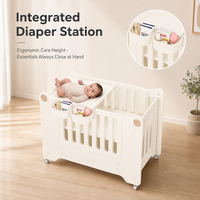 Lit bébé multifonctionnel 4-en-1 pour cododo avec station à couches et roulettes, vente en gros, OEM ODM