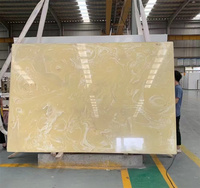 Dalle de pierre translucide en marbre d'onyx doré artificiel pour panneau mural
