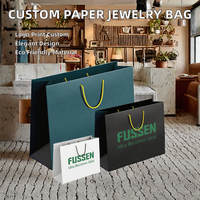 Sacs de shopping en papier personnalisés pour la vente au détail de bijoux, montres et lunettes