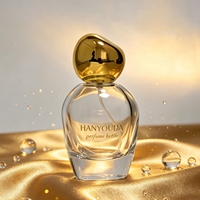Flacon de parfum en verre transparent 50ml 100ml avec bouchon irrégulier en forme de galet, capuchon doré/argenté/marron/nickel, pulvérisateur à pompe, gravure personnalisée du logo de la marque