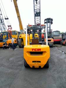 Used 3 Ton Mini TCM <b>Forklift</b> FD30 USA Diesel Engine 4WD Rough Terrain Three Stage Mast Solid Tires - Product Image 2
