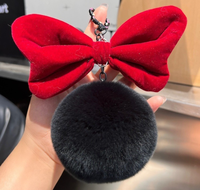 Vente en gros de porte-clés en peluche douce et moelleuse avec un grand nœud en fourrure, pompon en peluche, dessin animé d'Halloween, pendentif de sac, cœur