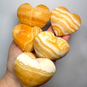 หินแกะสลักรูปหัวใจจากคริสตัลธรรมชาติขัดเงาแบบเป็นมิตรต่อสิ่งแวดล้อม ขายส่ง หินแคลไซต์สีส้มรูปหัวใจ สำหรับเป็นของขวัญตามหลักฮวงจุ้ย - Product Image 5