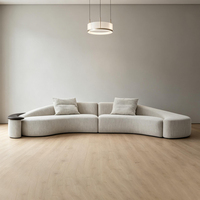 Canapé modulaire moderne en tissu incurvé rembourré de haute qualité, design haut de gamme pour salon et usage hôtelier